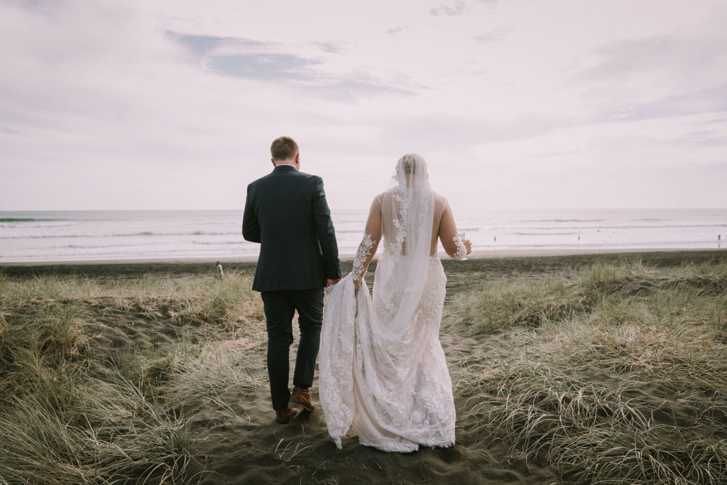 Real Bride Jamielle wearing her Custom Harriett Falvey Wedding Dress and Veil Made in New Zealand